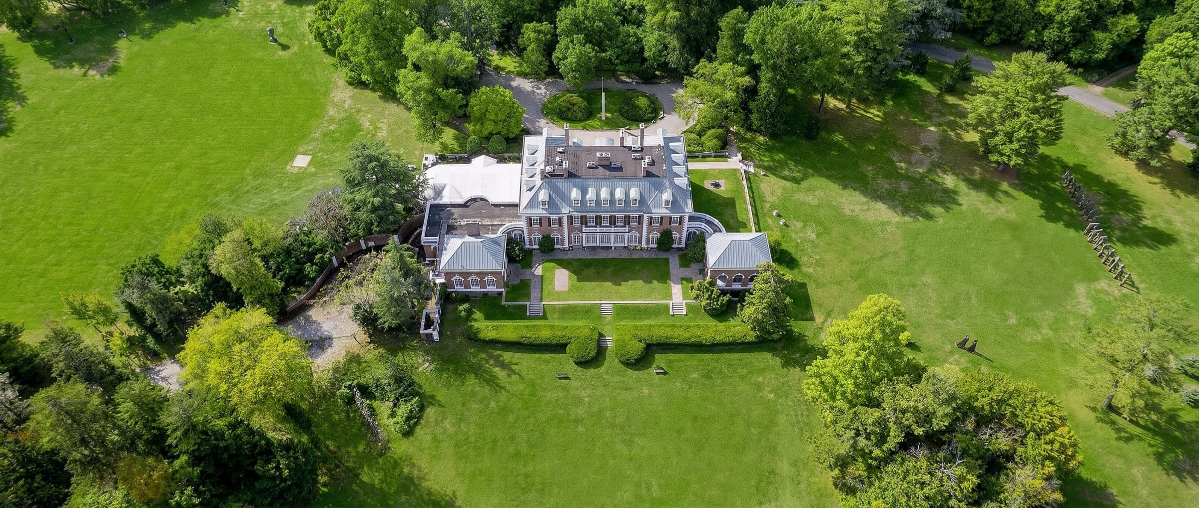 The formal gardens and estate grounds at Artistry